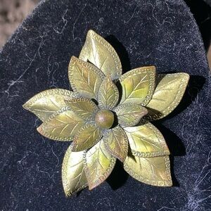 Vintage brass metal flower brooch